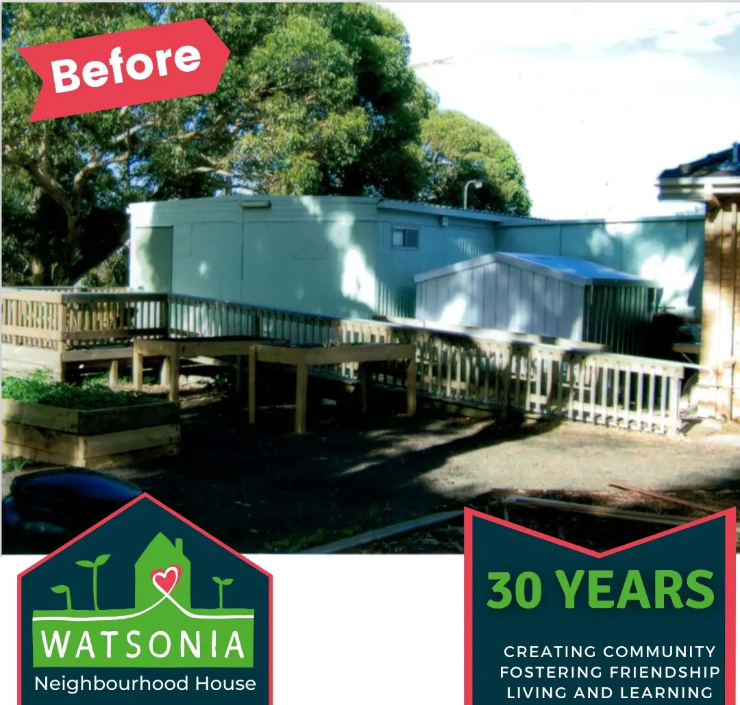 The rear of the house before renovation, with an old timber deck