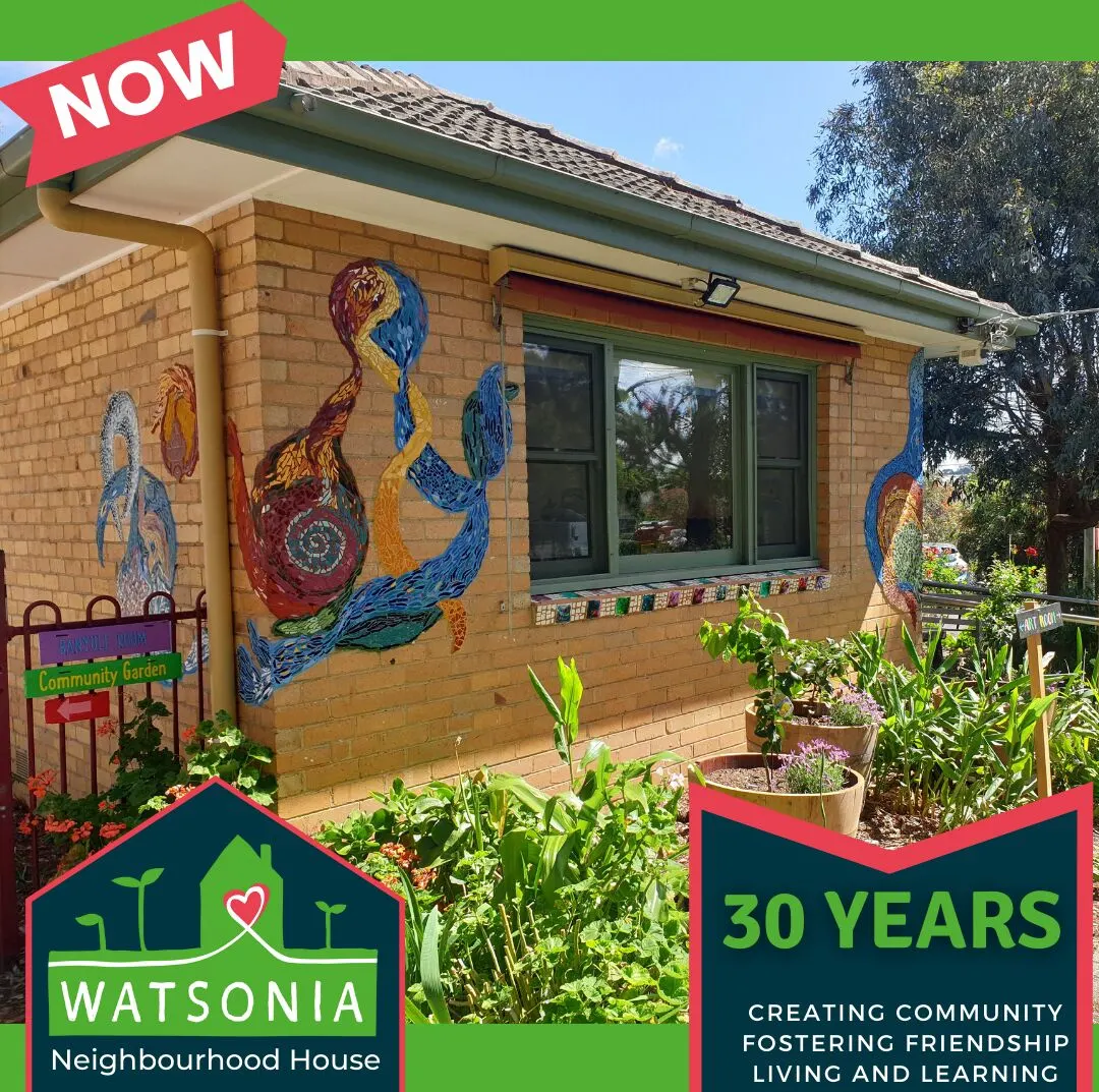 The house today: warm brick with a large mosaic mural beside the door